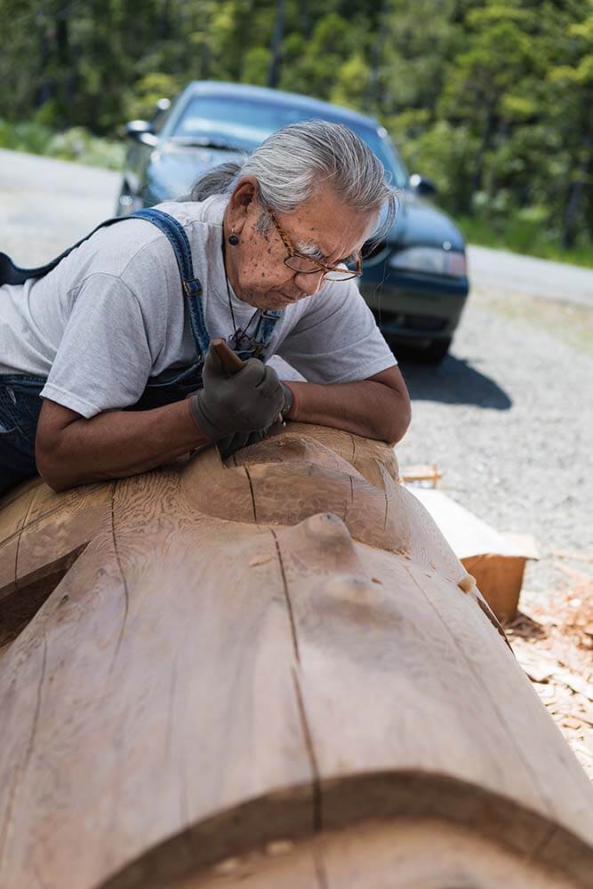 Charlie Melody carving totem